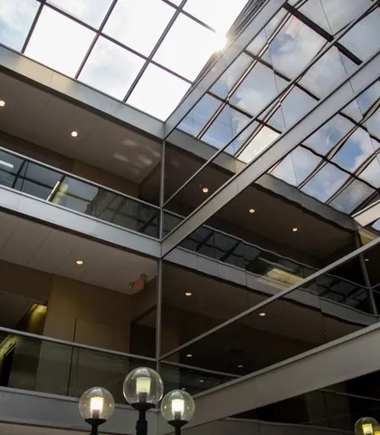 The glass-roofed atrium inside One Hollow Lane.